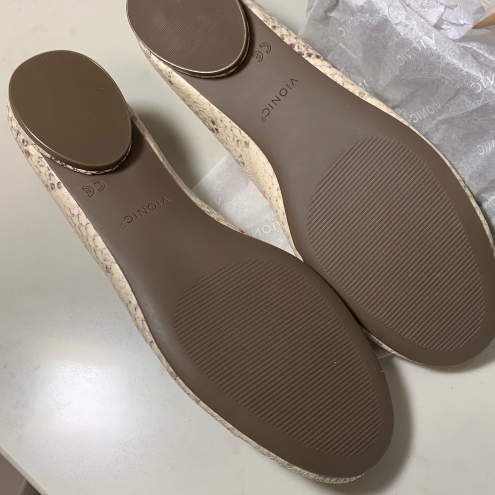 Woman’s Vionic flats. For high arch or plantar fasciitis